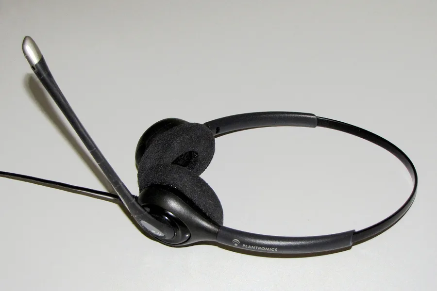 Micro-casque téléphonique professionnel binaural avec perche microphone